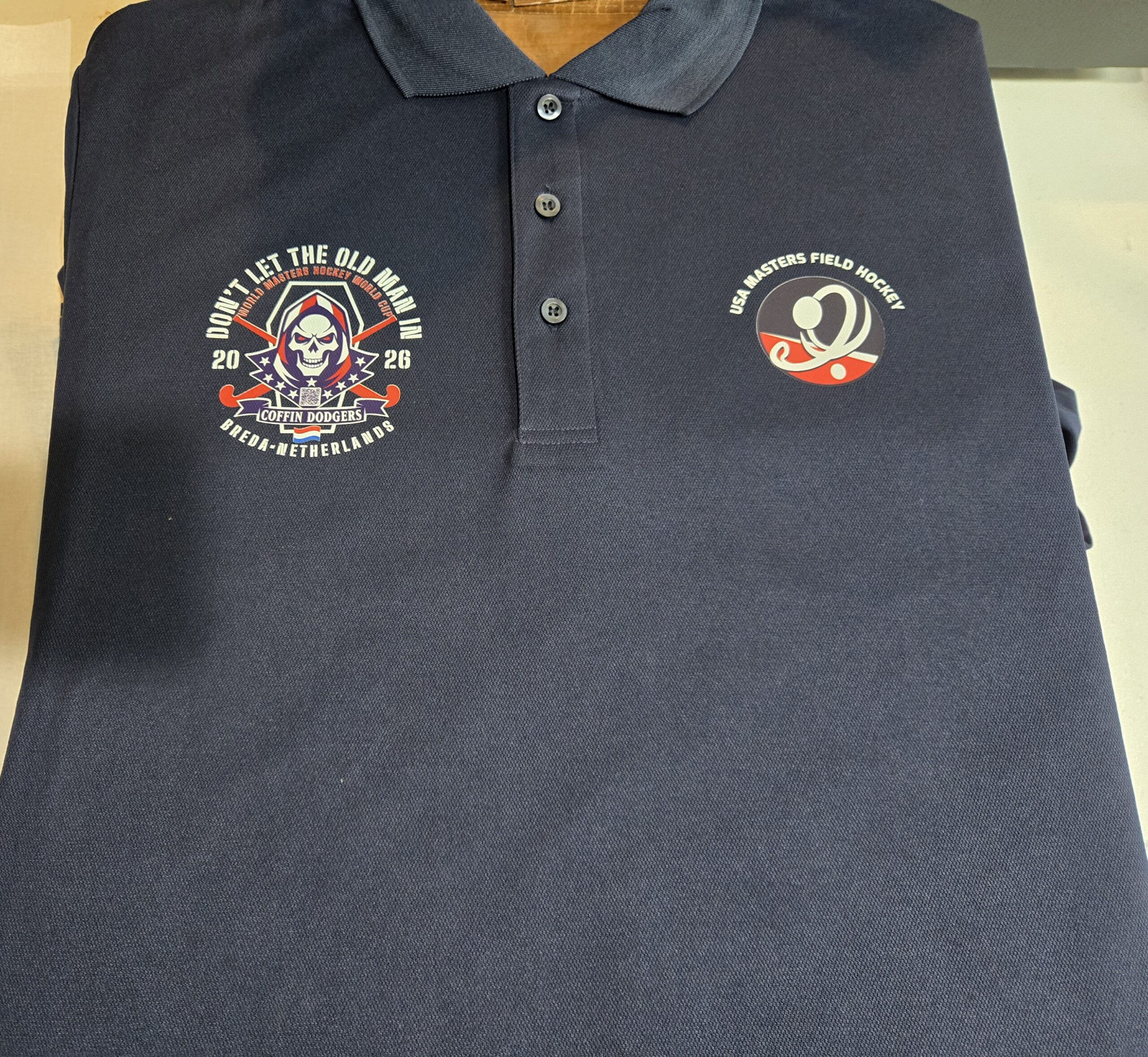Koozies, Man of the Match, and Dual Logo Navy Pique Polo